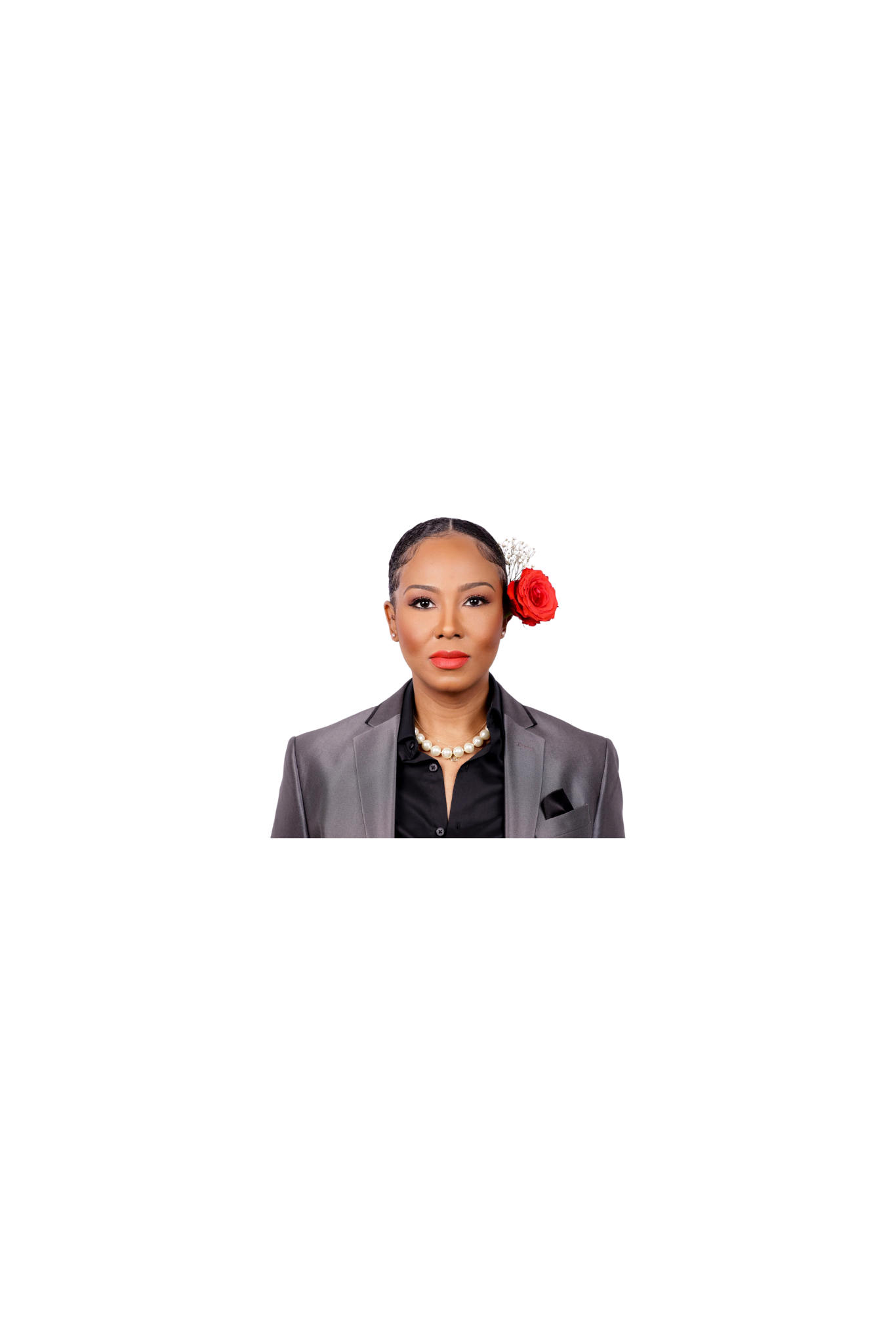 Banner featuring Lucky Tigereye with a half smile, wearing a shiny grey blazer over a black shirt, wavy bun with red rose on left ear, large pearl necklace, and gold necklace with compass pendant.